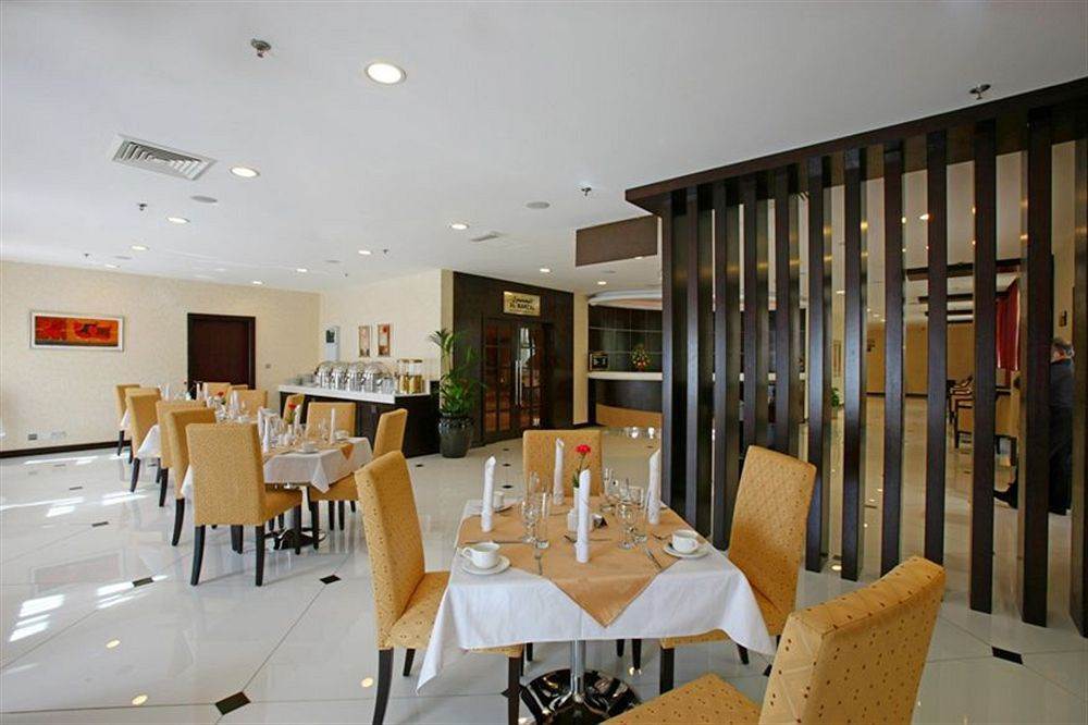 London Suites Hotel Dubái Restaurante foto